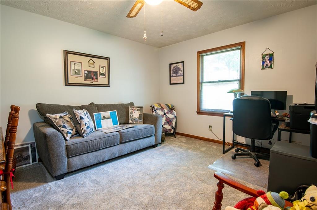 2966 Riviera Drive Conyers, GA 30012 - Photo 31 of 63 a living room with furniture and a window