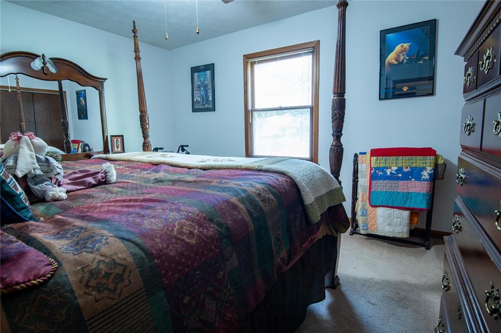 2966 Riviera Drive Conyers, GA 30012 - Photo 34 of 63 a bedroom with a bed and a window