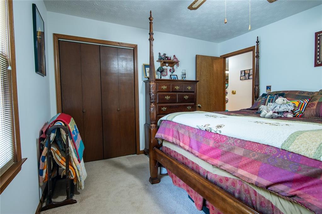 2966 Riviera Drive Conyers, GA 30012 - Photo 35 of 63 a bedroom with a bed and a closet