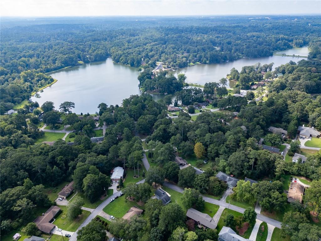 2966 Riviera Drive Conyers, GA 30012 - Photo 46 of 63 an aerial view of city and lake