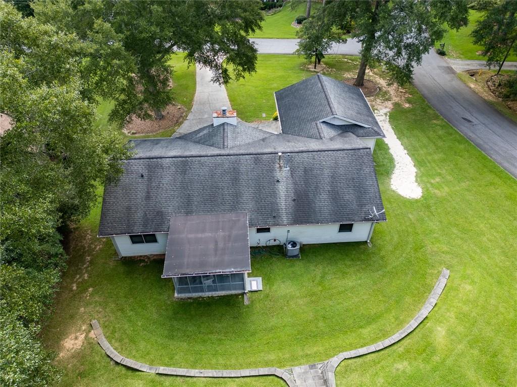 2966 Riviera Drive Conyers, GA 30012 - Photo 49 of 63 an aerial view of a house with swimming pool and patio