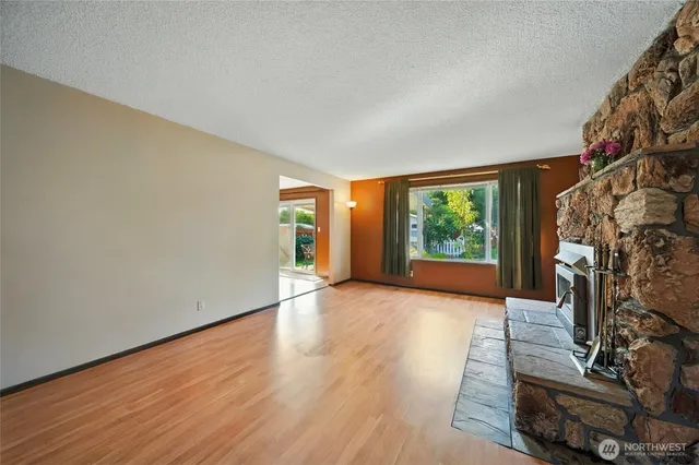 a view of livingroom with furniture window and front door