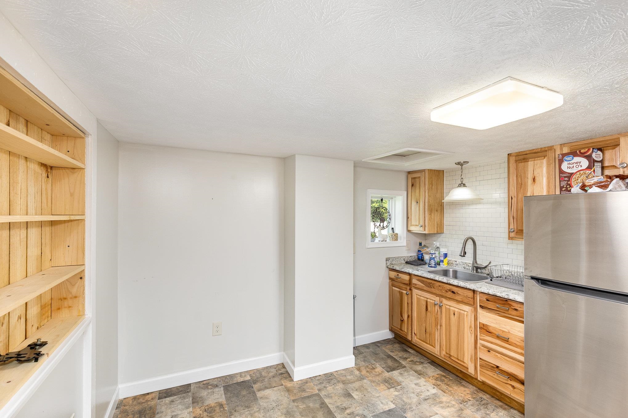 406 6th Street Luray, VA 22835 - Photo 13 of 28 a kitchen with stainless steel appliances a refrigerator and a sink