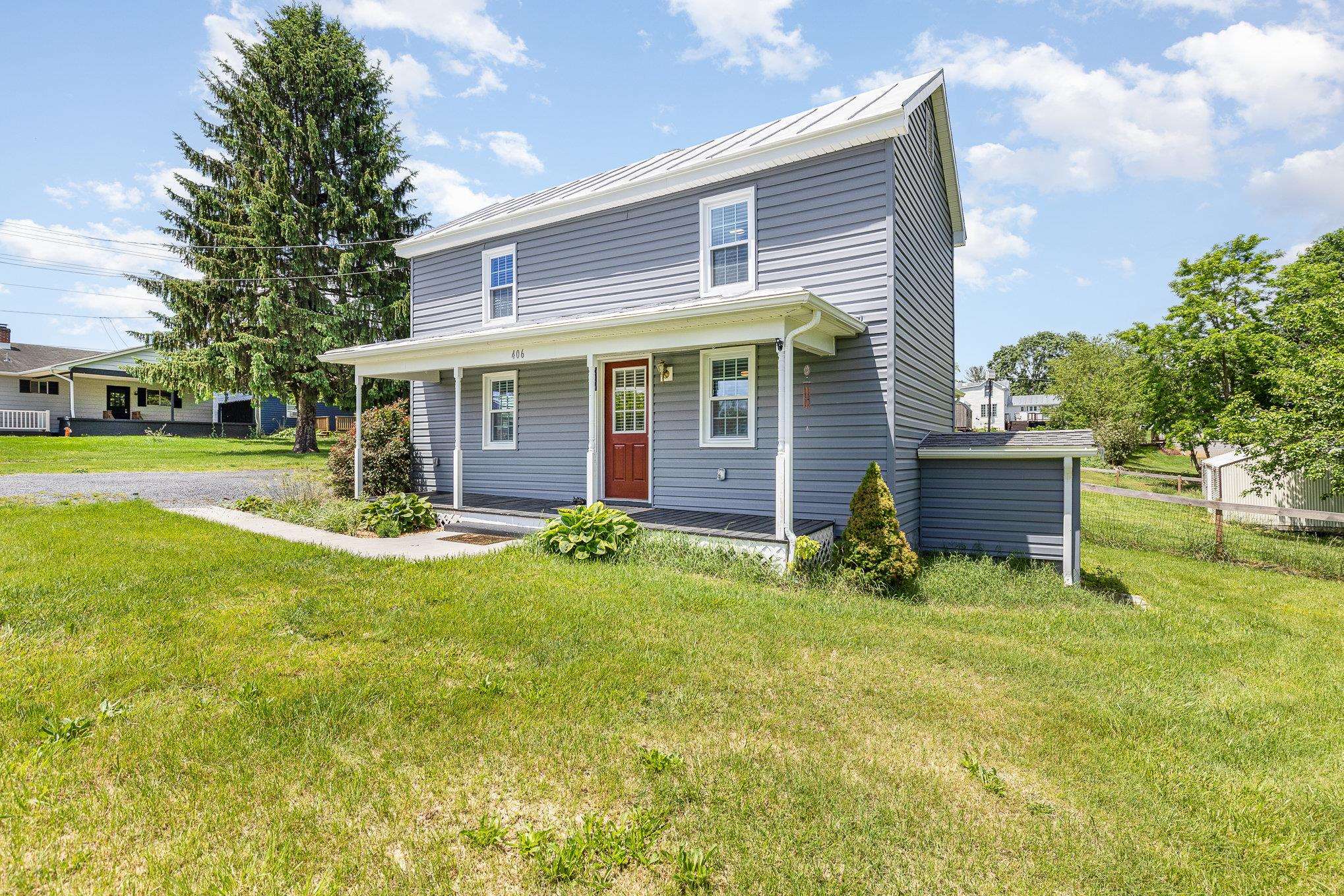 406 6th Street Luray, VA 22835 - Photo 2 of 28 a view of a house with backyard and a tree
