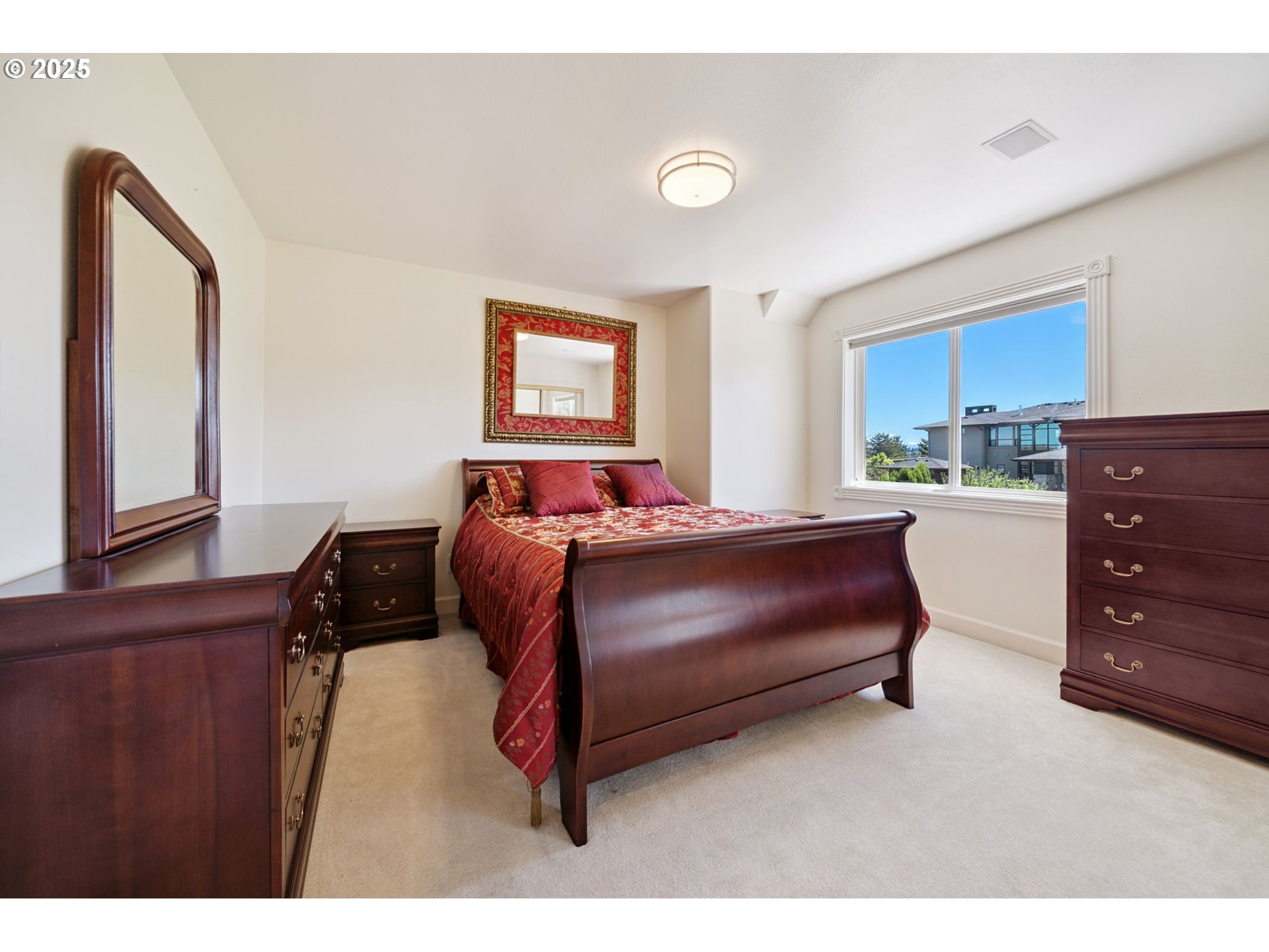 1650 Northwest Deerfern Street Camas, WA 98607 - Photo 23 of 47 a bedroom with a bed window and dresser