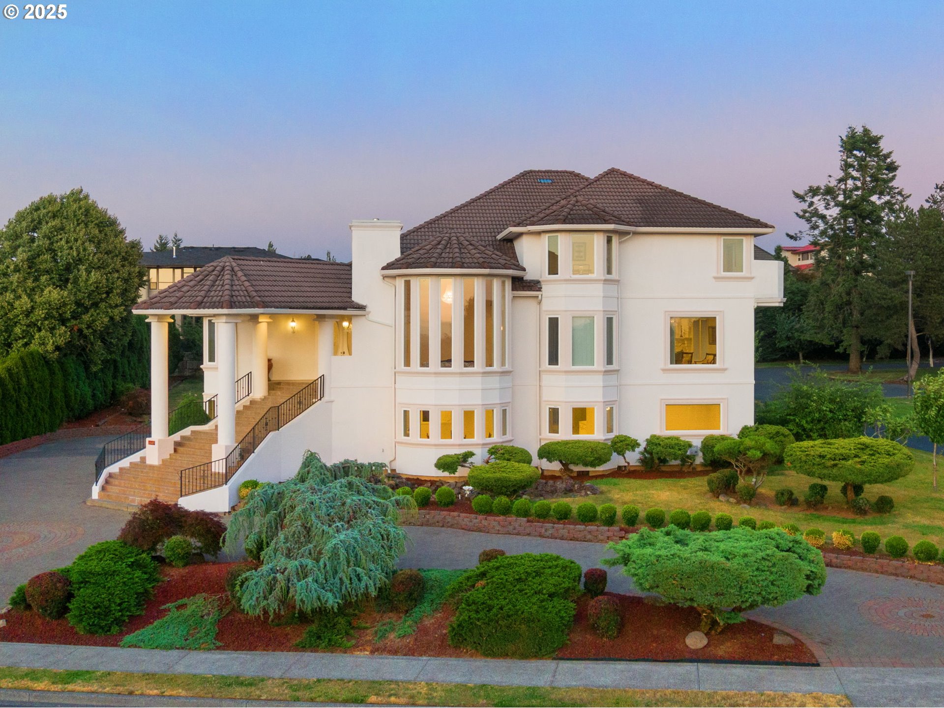 1650 Northwest Deerfern Street Camas, WA 98607 - Photo 3 of 47 a front view of a house with garden