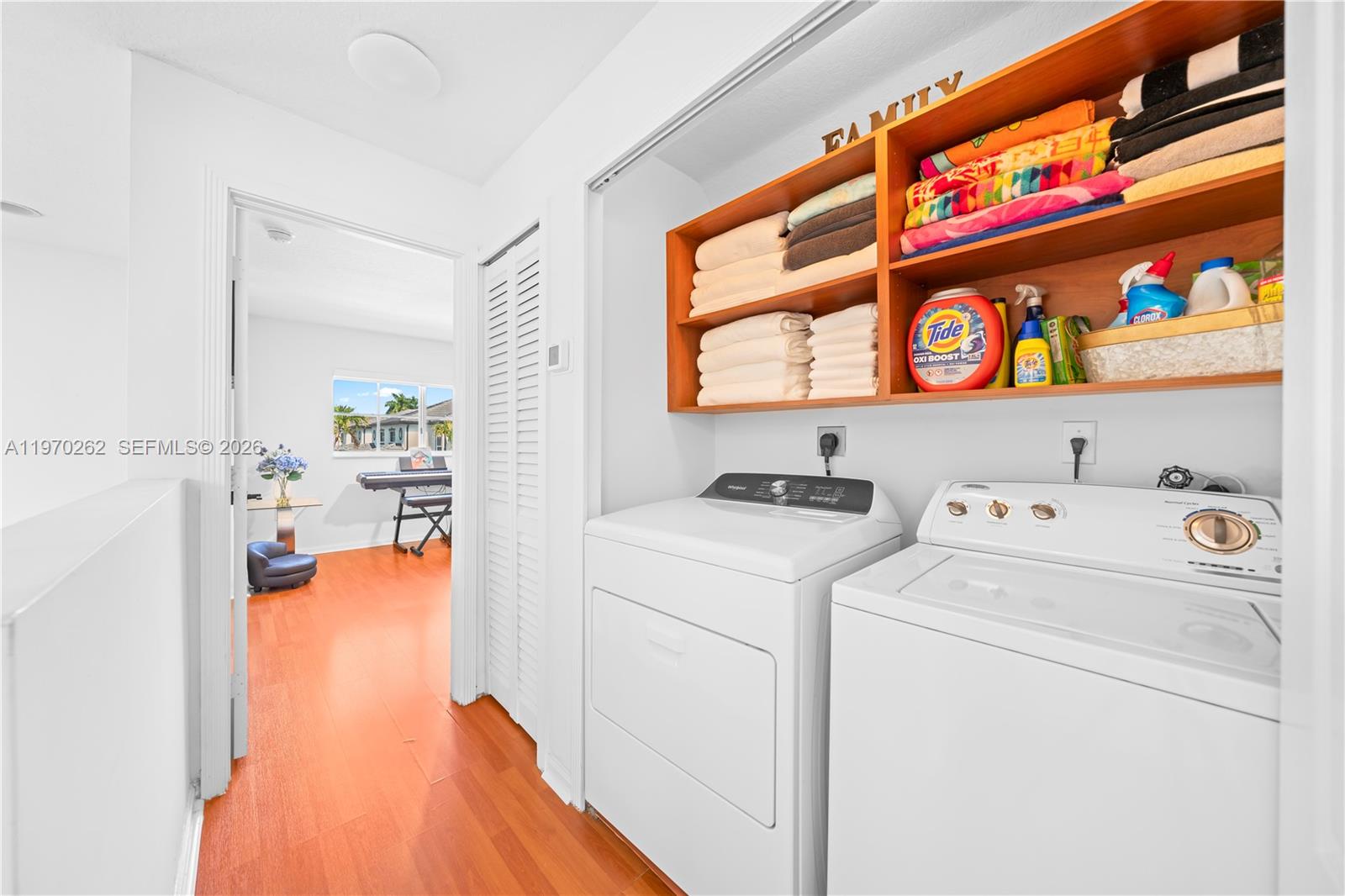 12858 Southwest 50th Street Miramar, FL 33027 - Photo 12 of 36 a view of walk in closet with clothes and shoes