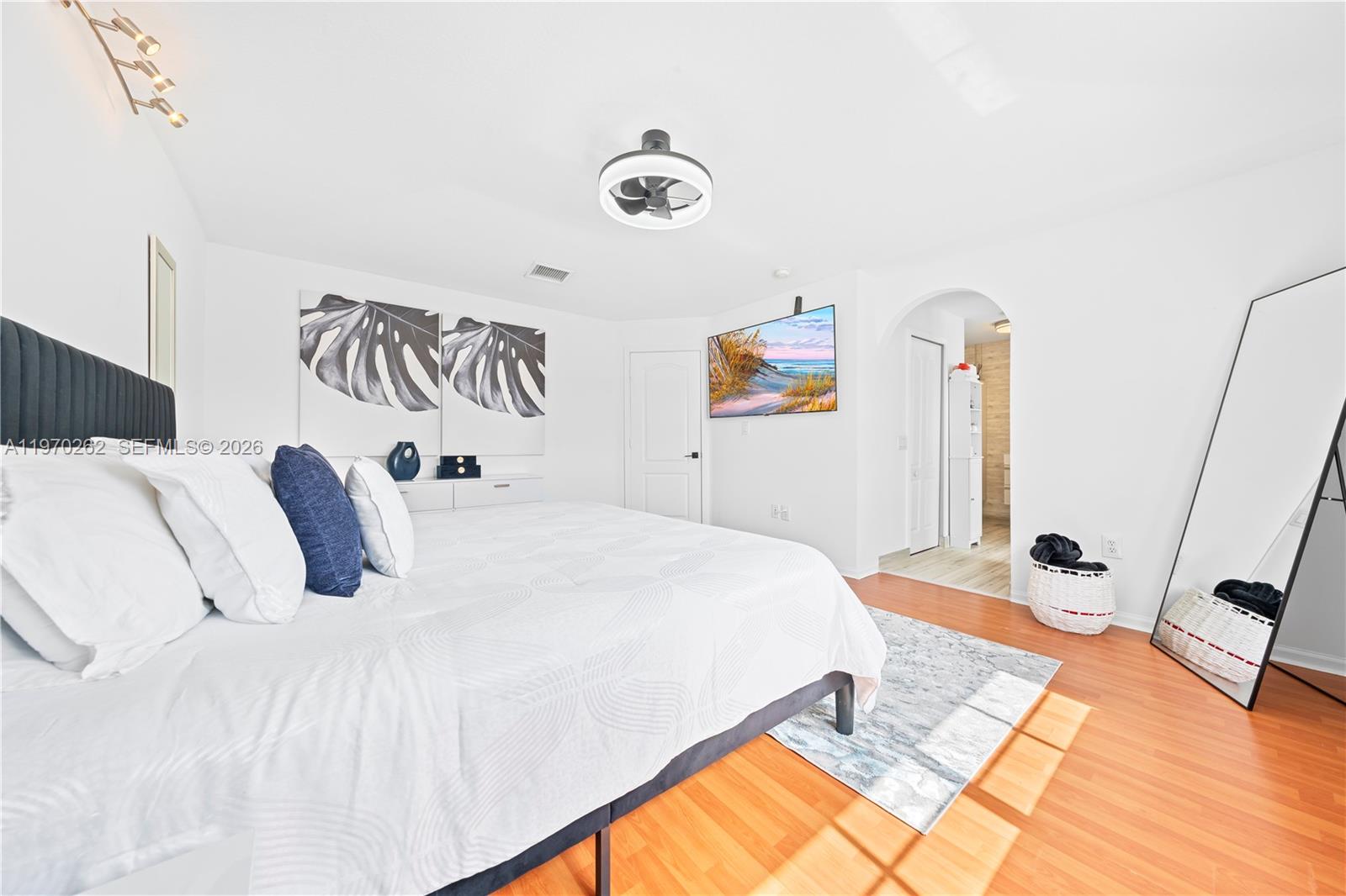 12858 Southwest 50th Street Miramar, FL 33027 - Photo 15 of 36 a bedroom with a bed and walk in closet