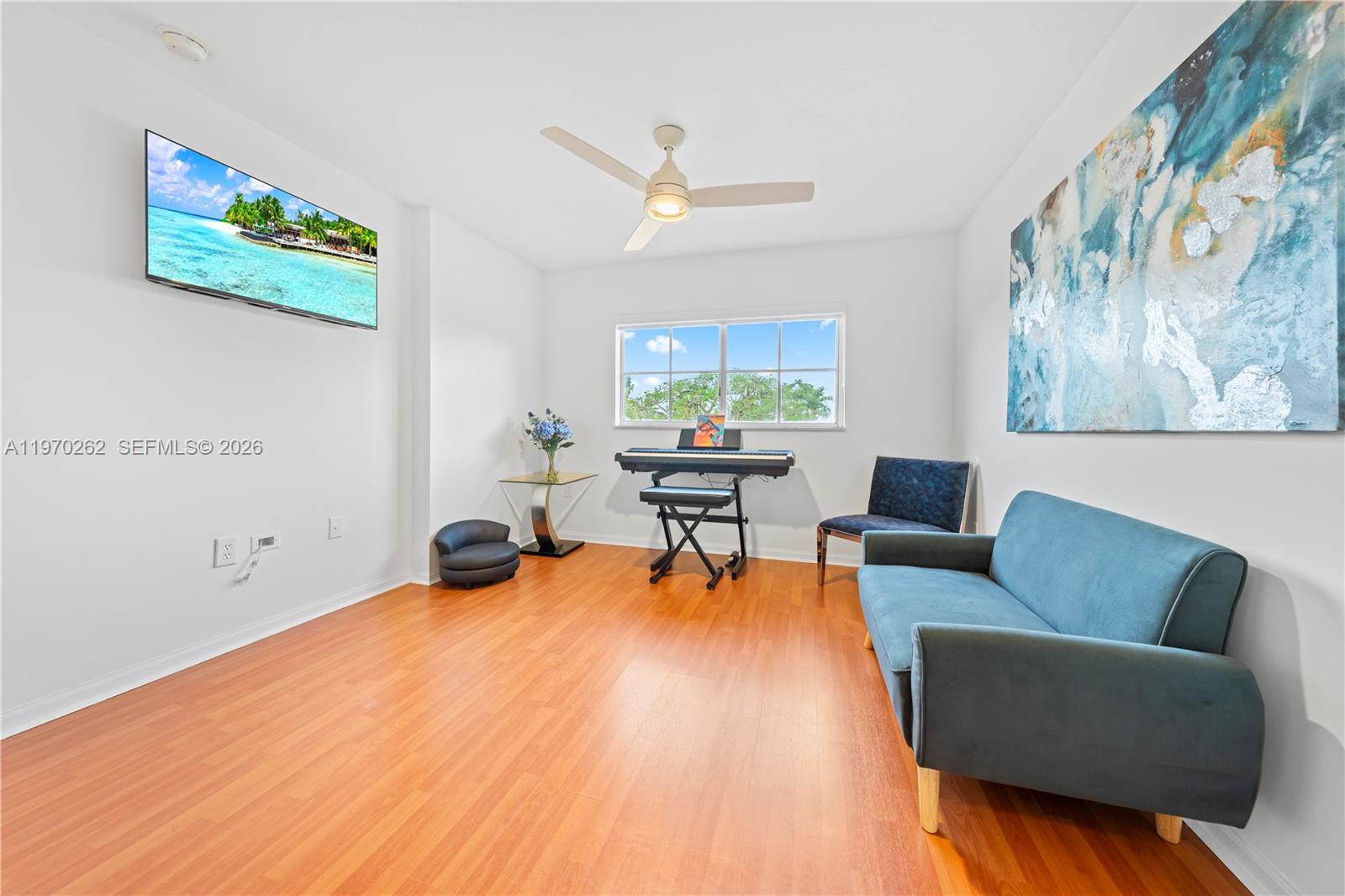 12858 Southwest 50th Street Miramar, FL 33027 - Photo 21 of 36 a living room with furniture and a large window