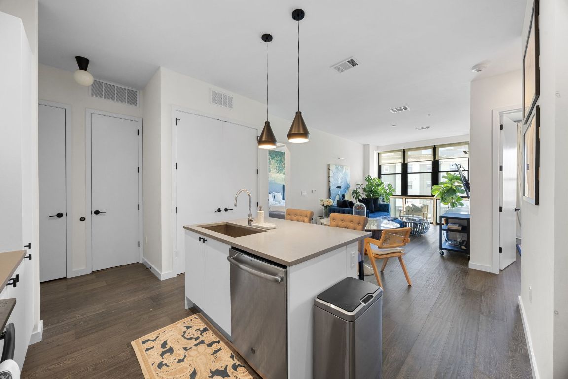 800 Embassy Drive, Unit 229 Austin, TX 78702 - Photo 8 of 40 a view of a kitchen and dining room