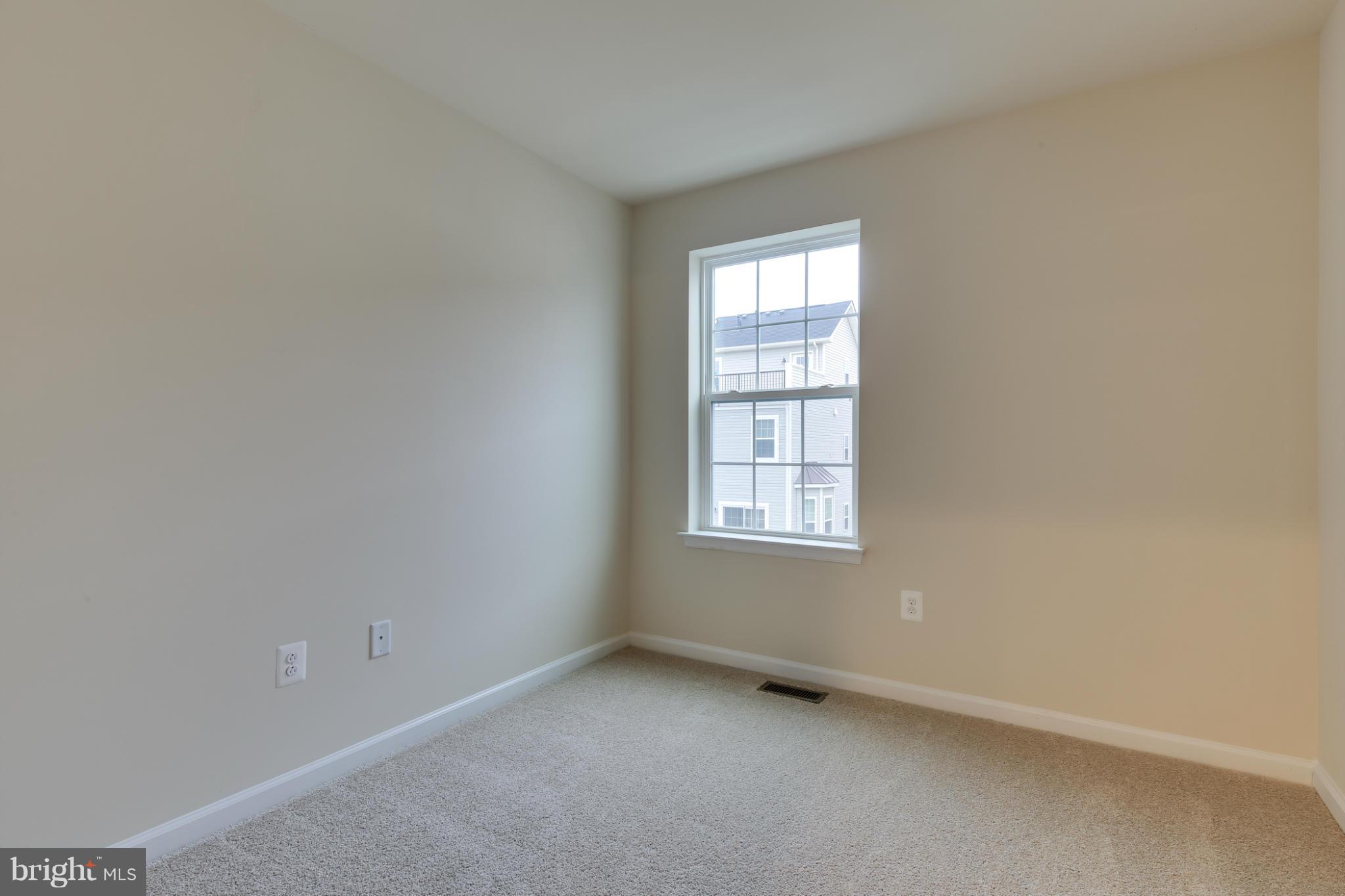 7240 Brinley Way Hanover, MD 21076 - Photo 15 of 22 an empty room with a window