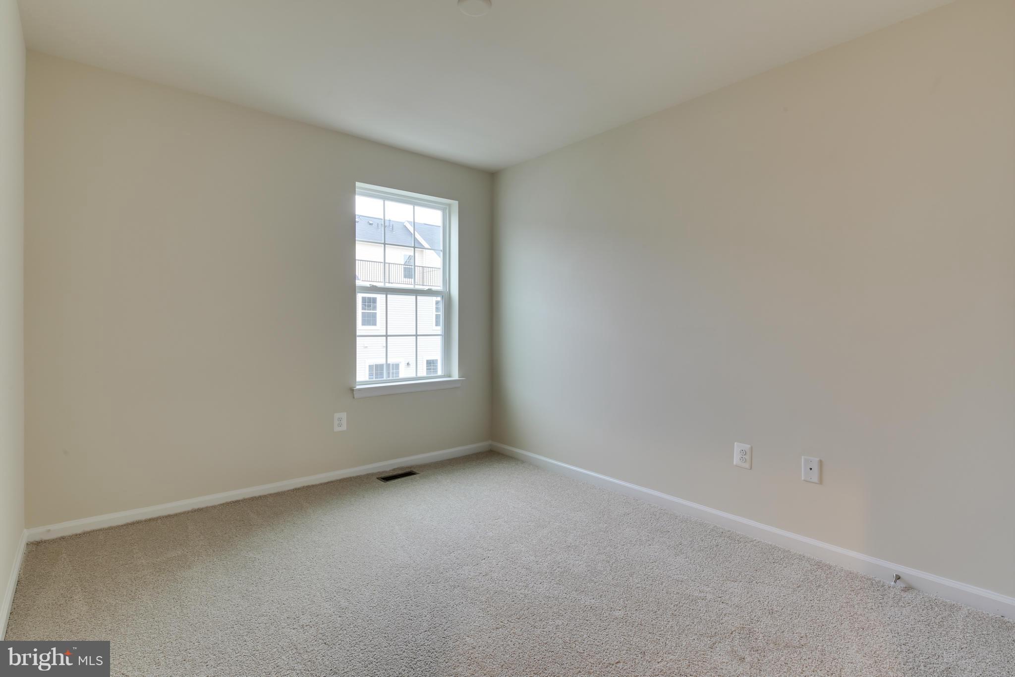 7240 Brinley Way Hanover, MD 21076 - Photo 16 of 22 an empty room with a window