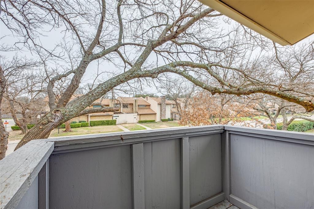 5833 Harvest Hill Road, Unit 2071 Dallas, TX 75230 - Photo 12 of 13 a view of a house with a tree