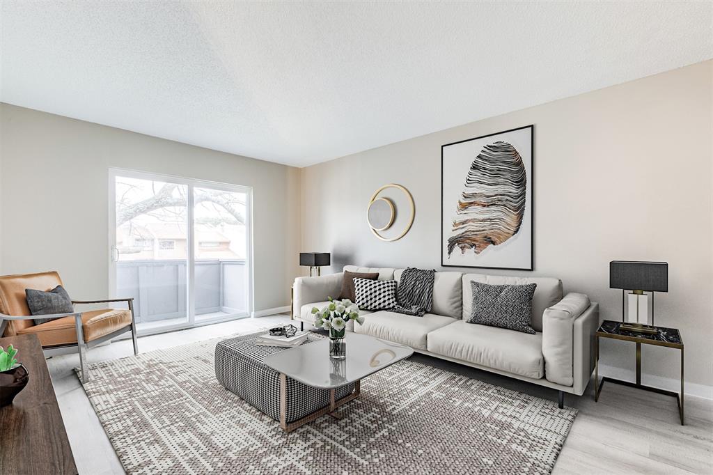 5833 Harvest Hill Road, Unit 2071 Dallas, TX 75230 - Photo 2 of 13 a living room with furniture and a large window