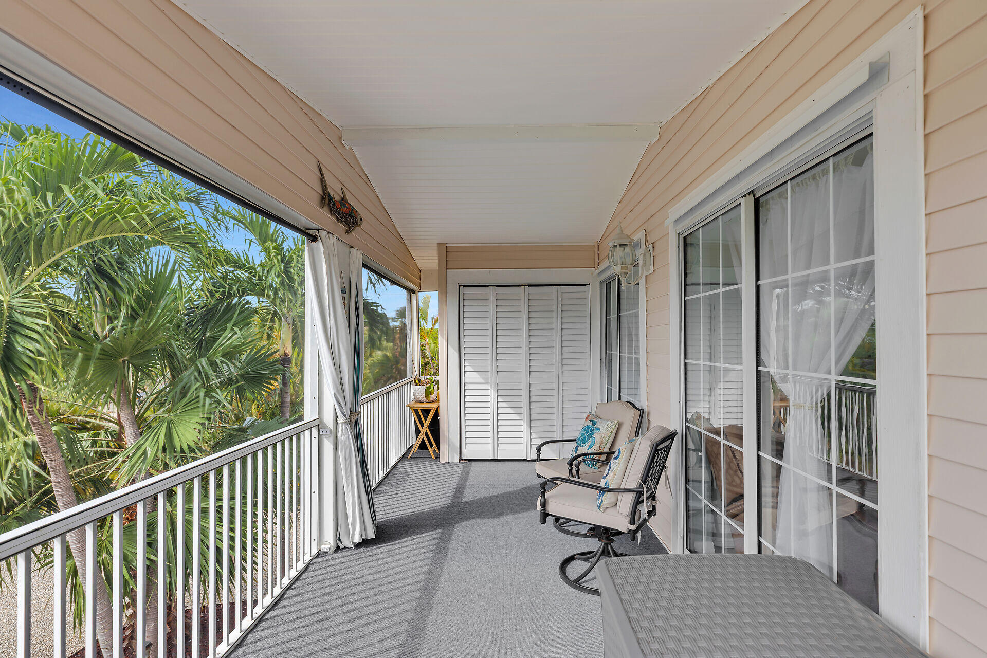 23012 Snapper Lane Cudjoe, FL 33042 - Photo 11 of 45 a view of balcony with couch