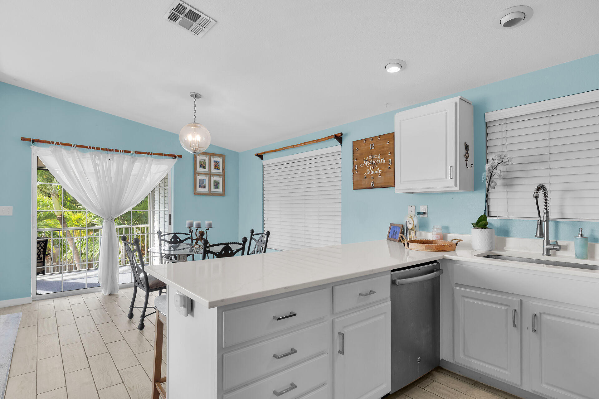 23012 Snapper Lane Cudjoe, FL 33042 - Photo 21 of 45 a kitchen with a sink cabinets and window