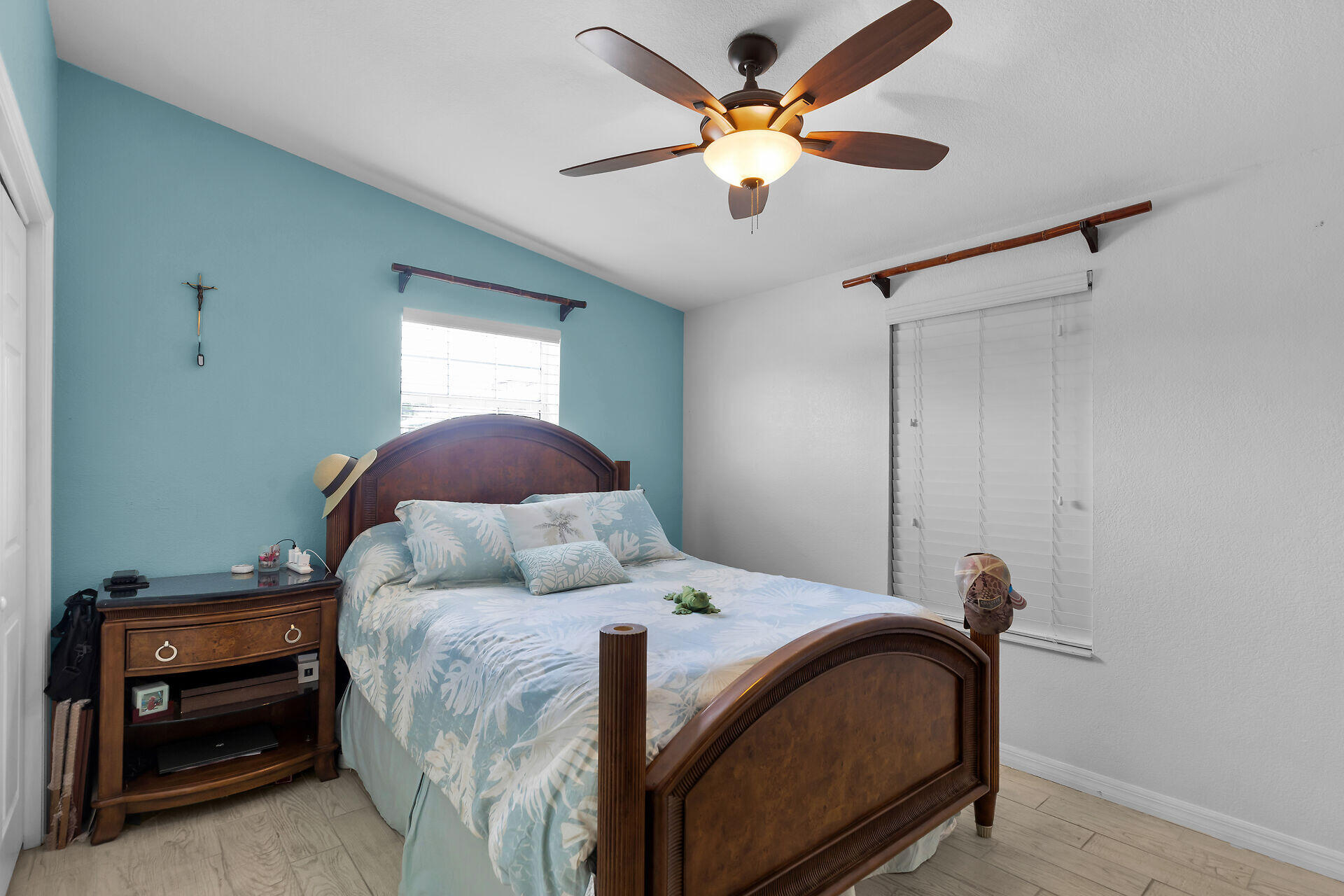 23012 Snapper Lane Cudjoe, FL 33042 - Photo 23 of 45 a bedroom with a bed and a ceiling fan