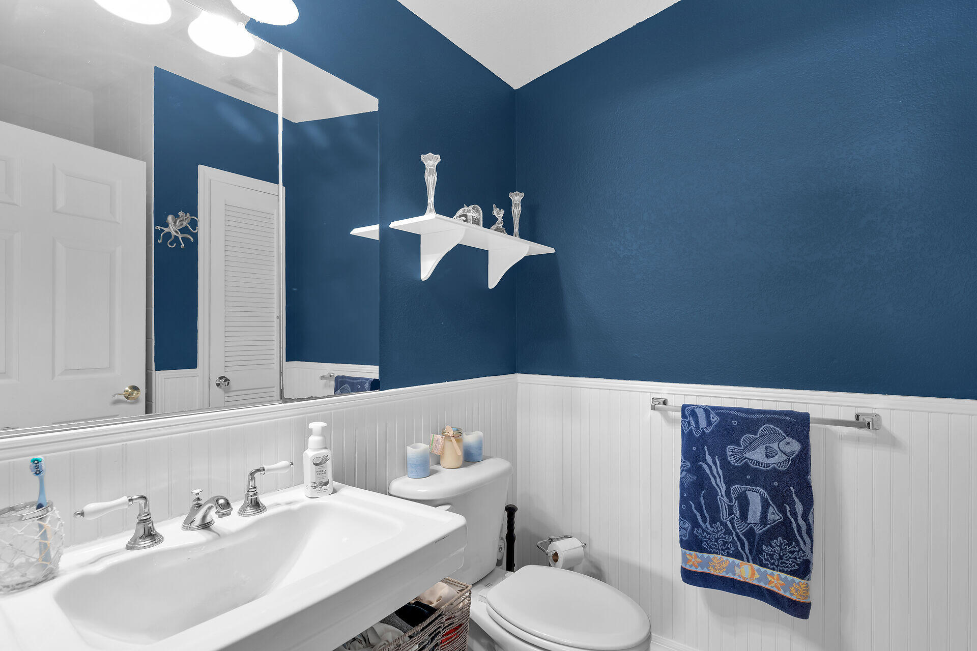 23012 Snapper Lane Cudjoe, FL 33042 - Photo 26 of 45 a bathroom with a sink vanity and toilet