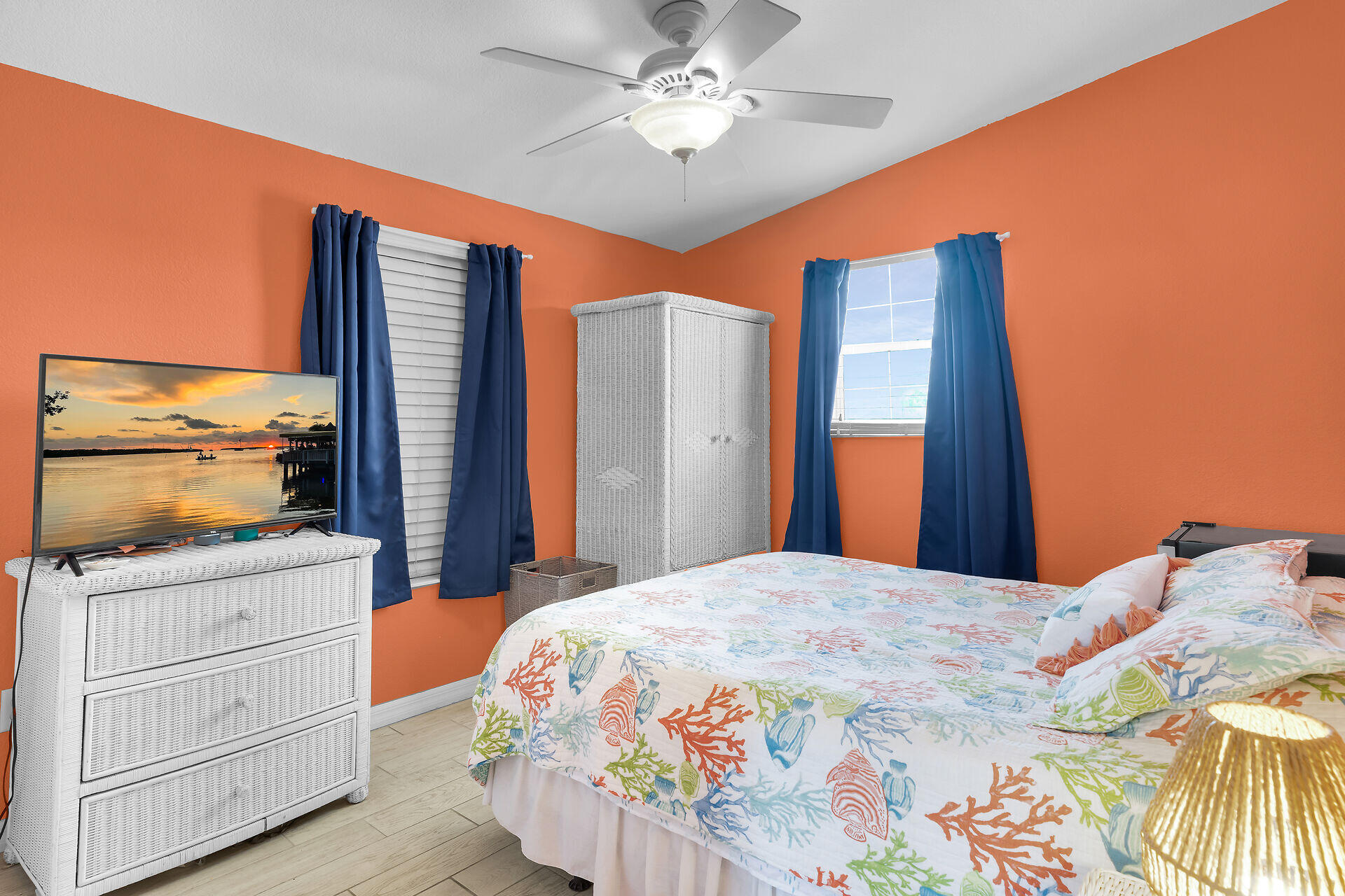 23012 Snapper Lane Cudjoe, FL 33042 - Photo 28 of 45 a bedroom with a bed and a flat screen tv