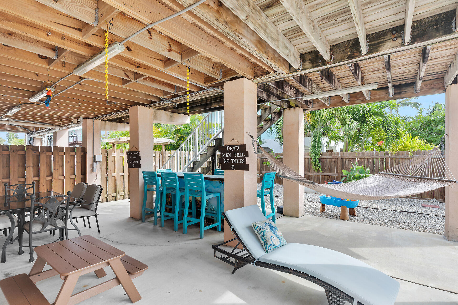 23012 Snapper Lane Cudjoe, FL 33042 - Photo 34 of 45 a view of a chairs and table in a patio
