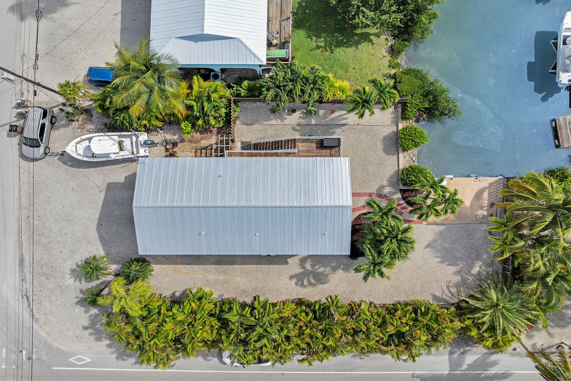 23012 Snapper Lane Cudjoe, FL 33042 - Photo 4 of 45 a view of a flower in a garden