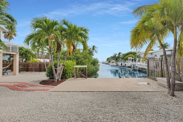 a view of a backyard of a house