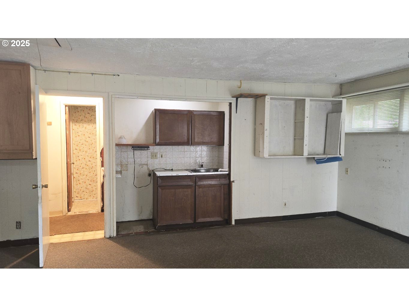 19520 Southwest Kinnaman Road Beaverton, OR 97078 - Photo 26 of 47 a black and white kitchen with a sink
