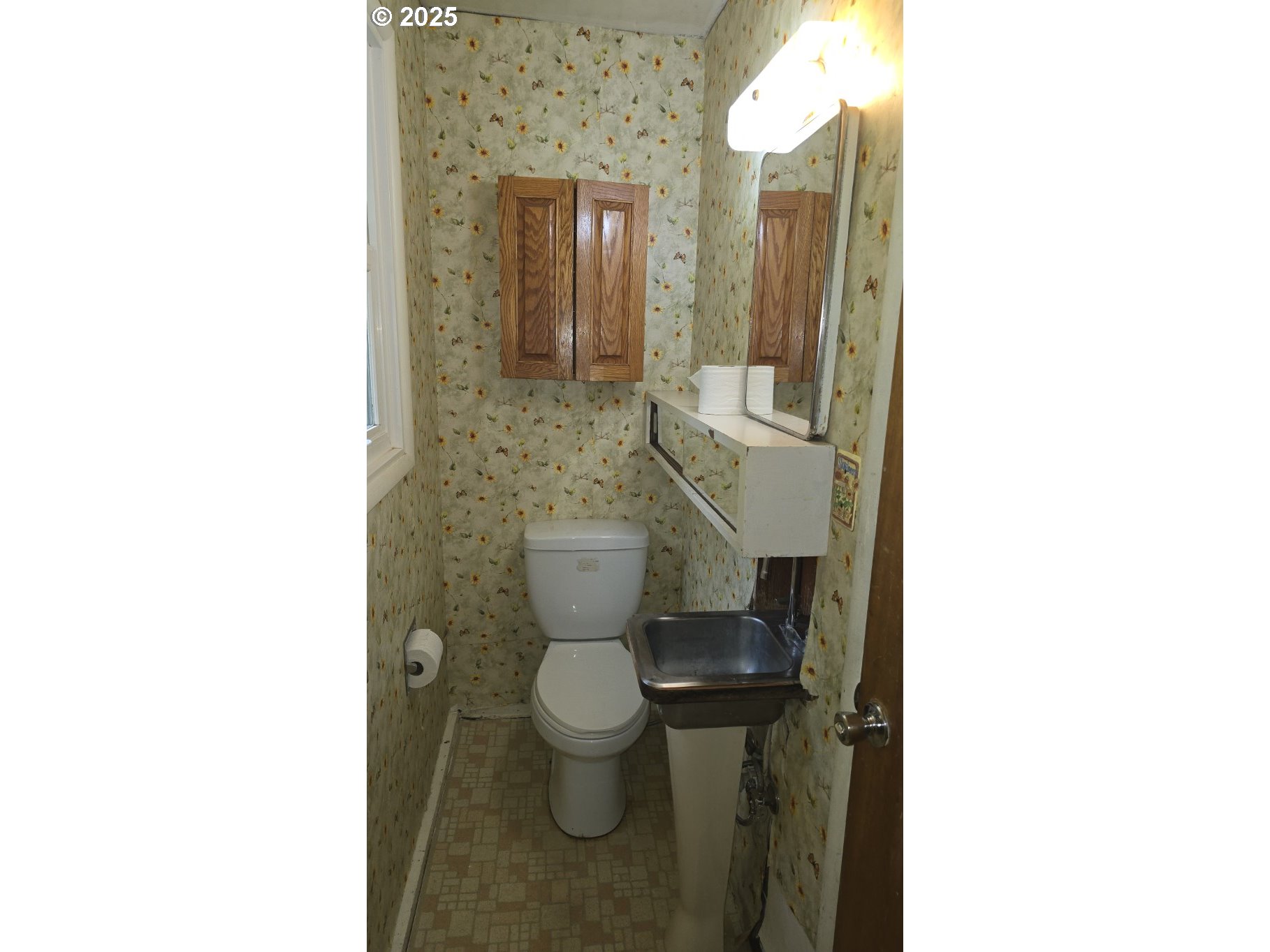 19520 Southwest Kinnaman Road Beaverton, OR 97078 - Photo 30 of 47 a bathroom with a toilet and a mirror