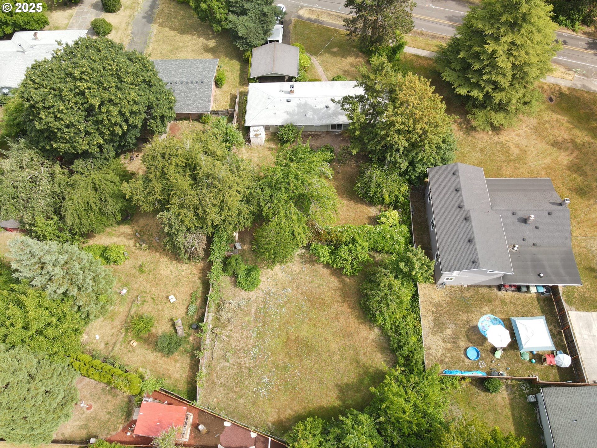 19520 Southwest Kinnaman Road Beaverton, OR 97078 - Photo 46 of 47 an aerial view of houses with yard