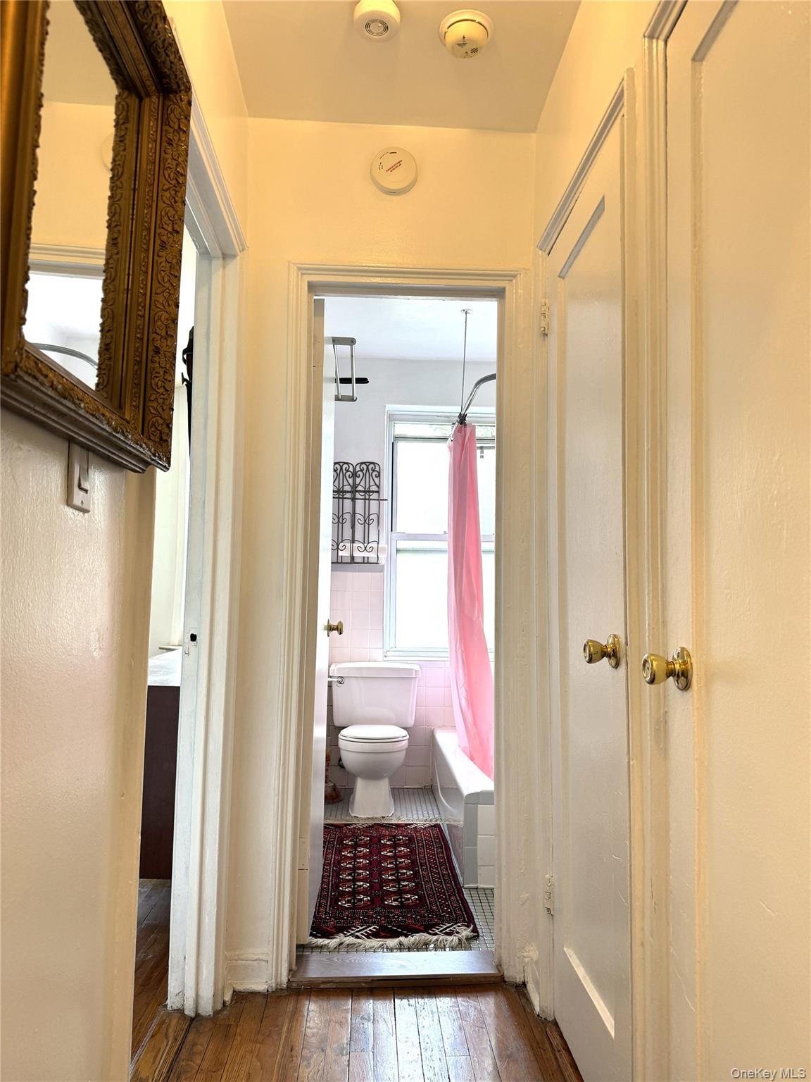 141-24 78th Road, Unit 3A Queens, NY 11367 - Photo 13 of 18 a bathroom with a sink toilet and shower