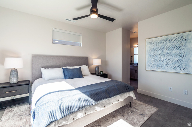 2972 West 570 North Hurricane, UT 84737 - Photo 48 of 104 Bedroom featuring a ceiling fan and connected bathroom