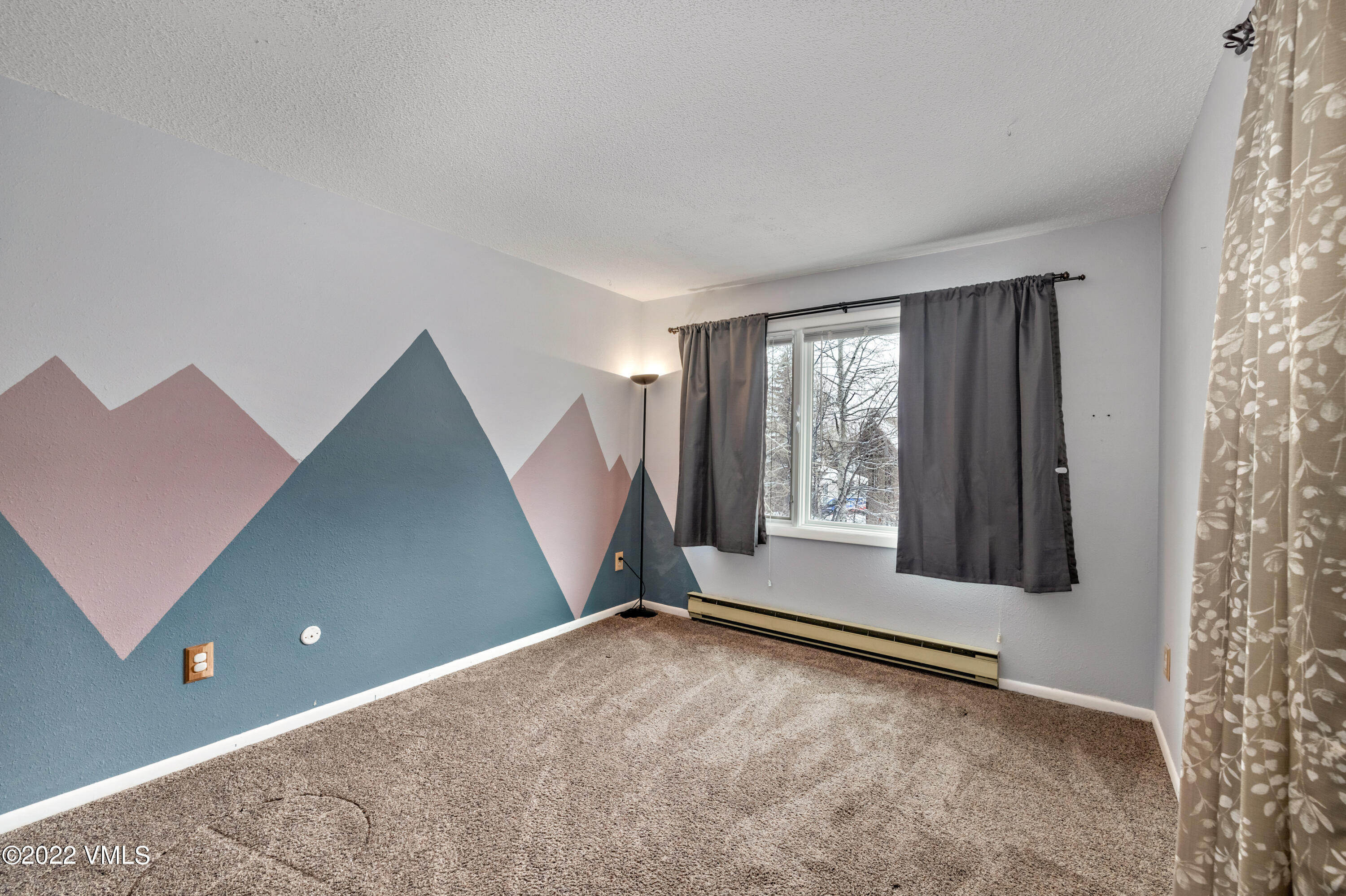 225 Gopher Road, Unit 56 Avon, CO 81620 - Photo 11 of 20 a view of an empty room with a window