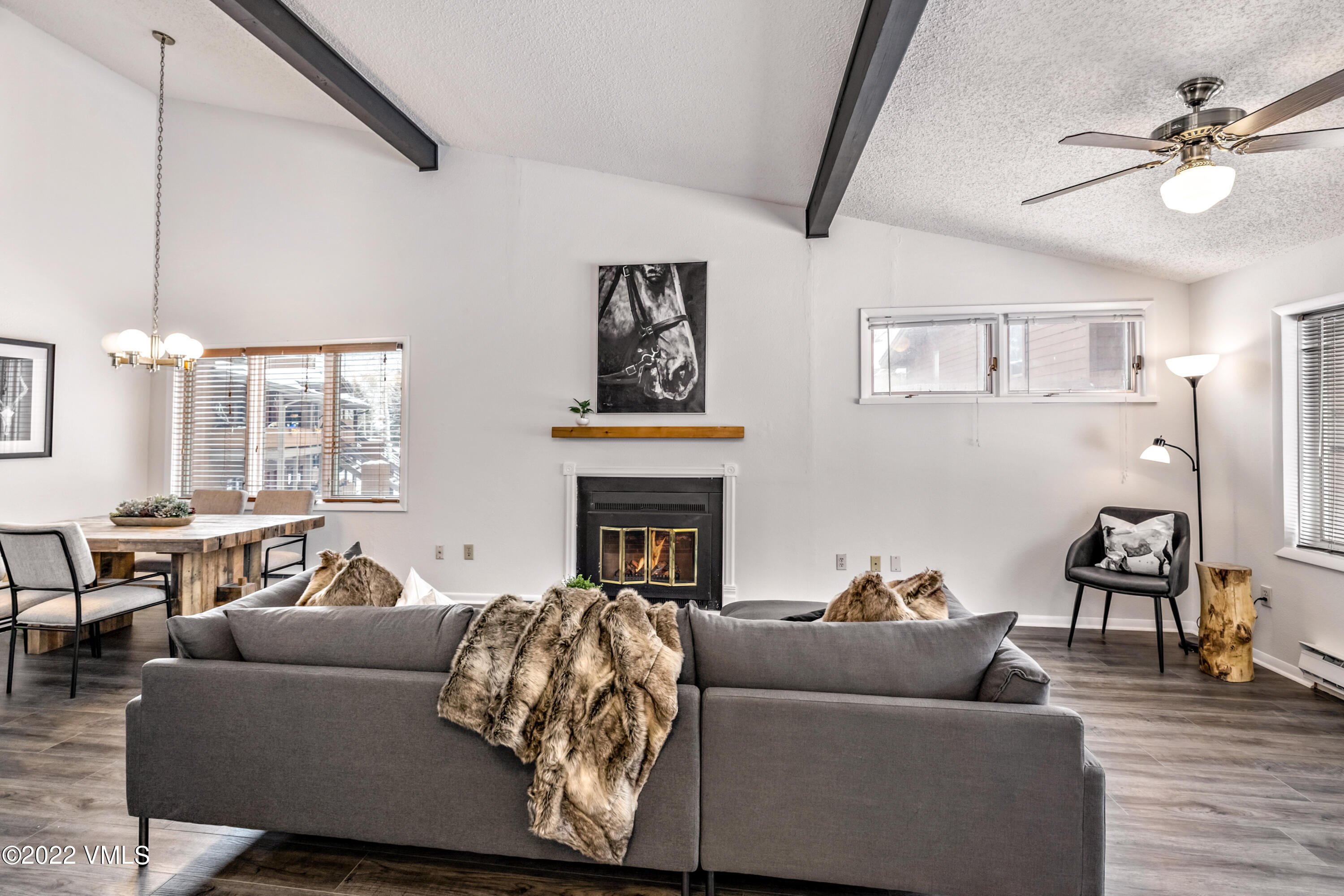 225 Gopher Road, Unit 56 Avon, CO 81620 - Photo 18 of 20 a living room with furniture and a fireplace