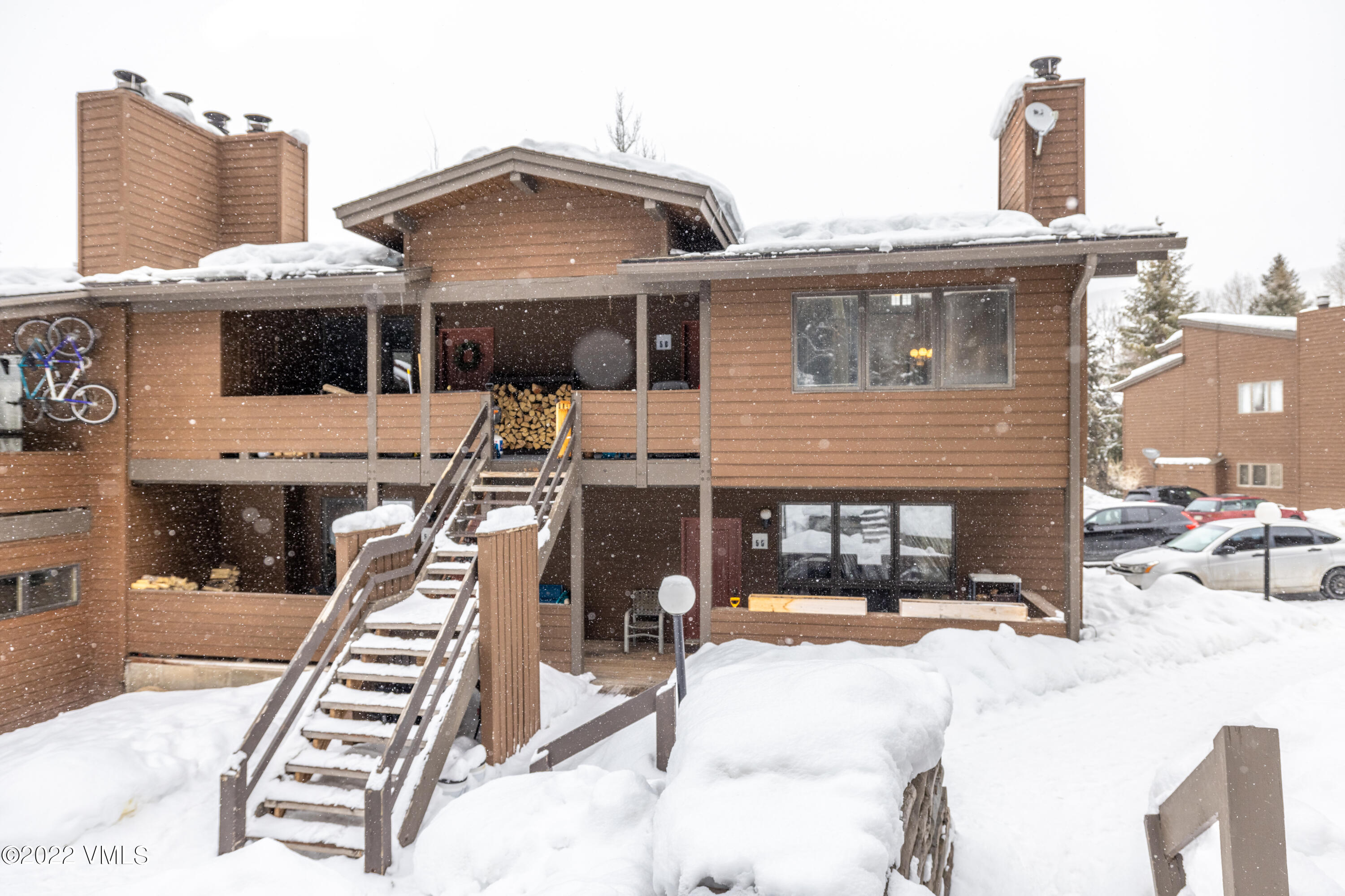 225 Gopher Road, Unit 56 Avon, CO 81620 - Photo 19 of 20 a front view of a house with a porch