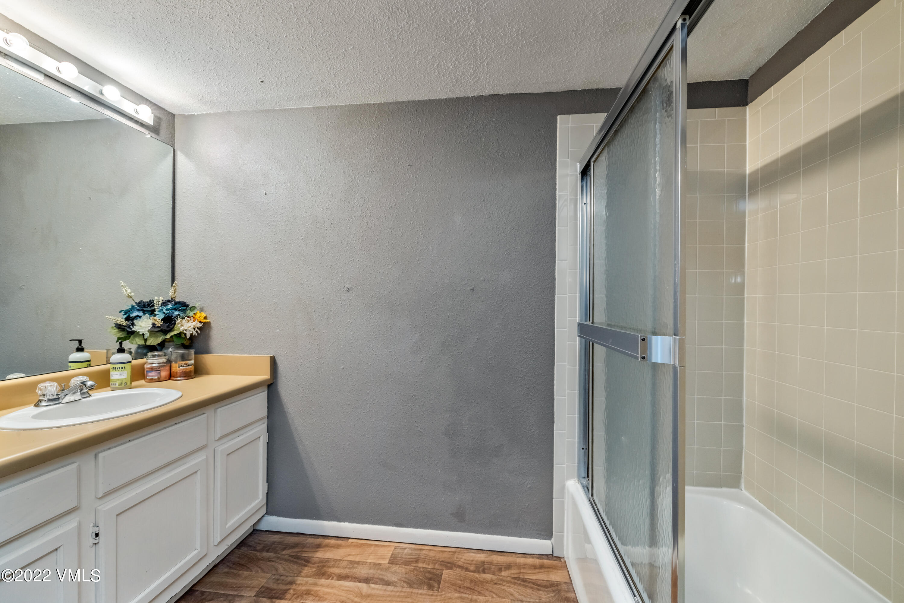 225 Gopher Road, Unit 56 Avon, CO 81620 - Photo 9 of 20 a bathroom with a sink and mirror