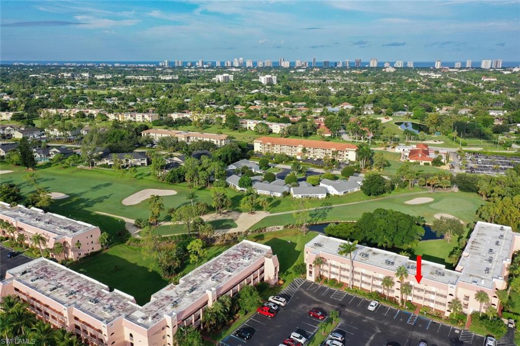 100 Forest Lakes Boulevard, Unit 305 Naples, FL 34105 - Photo 1 of 31 Drone / aerial view