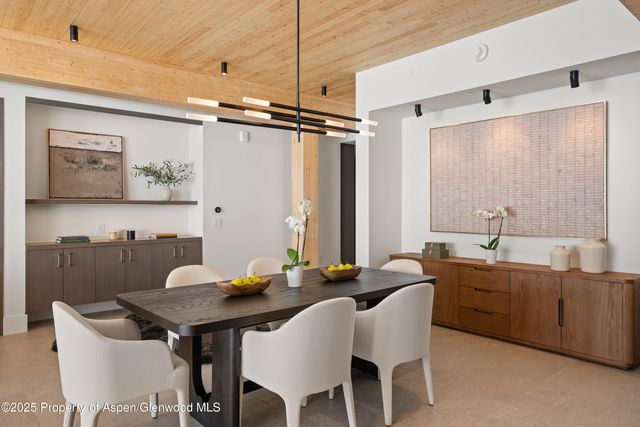 a kitchen with a sink a counter space and appliances