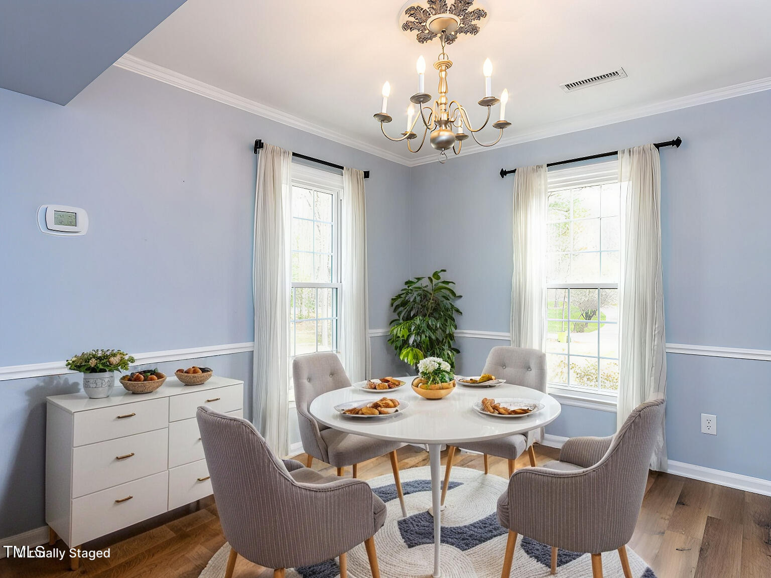 7408 Stable End Road Raleigh, NC 27613 - Photo 11 of 39 a view of a dining room with furniture and window