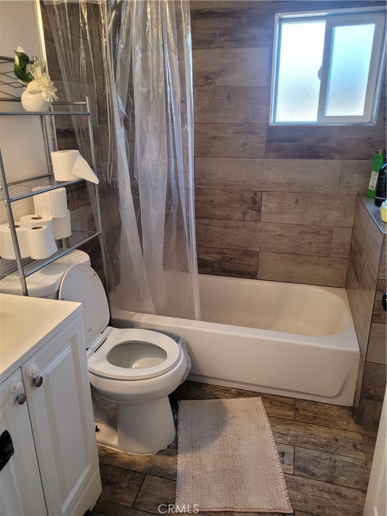 3833 1/2 Olive Street Huntington Park, CA 90255 - Photo 8 of 8 a bathroom with a sink and a toilet