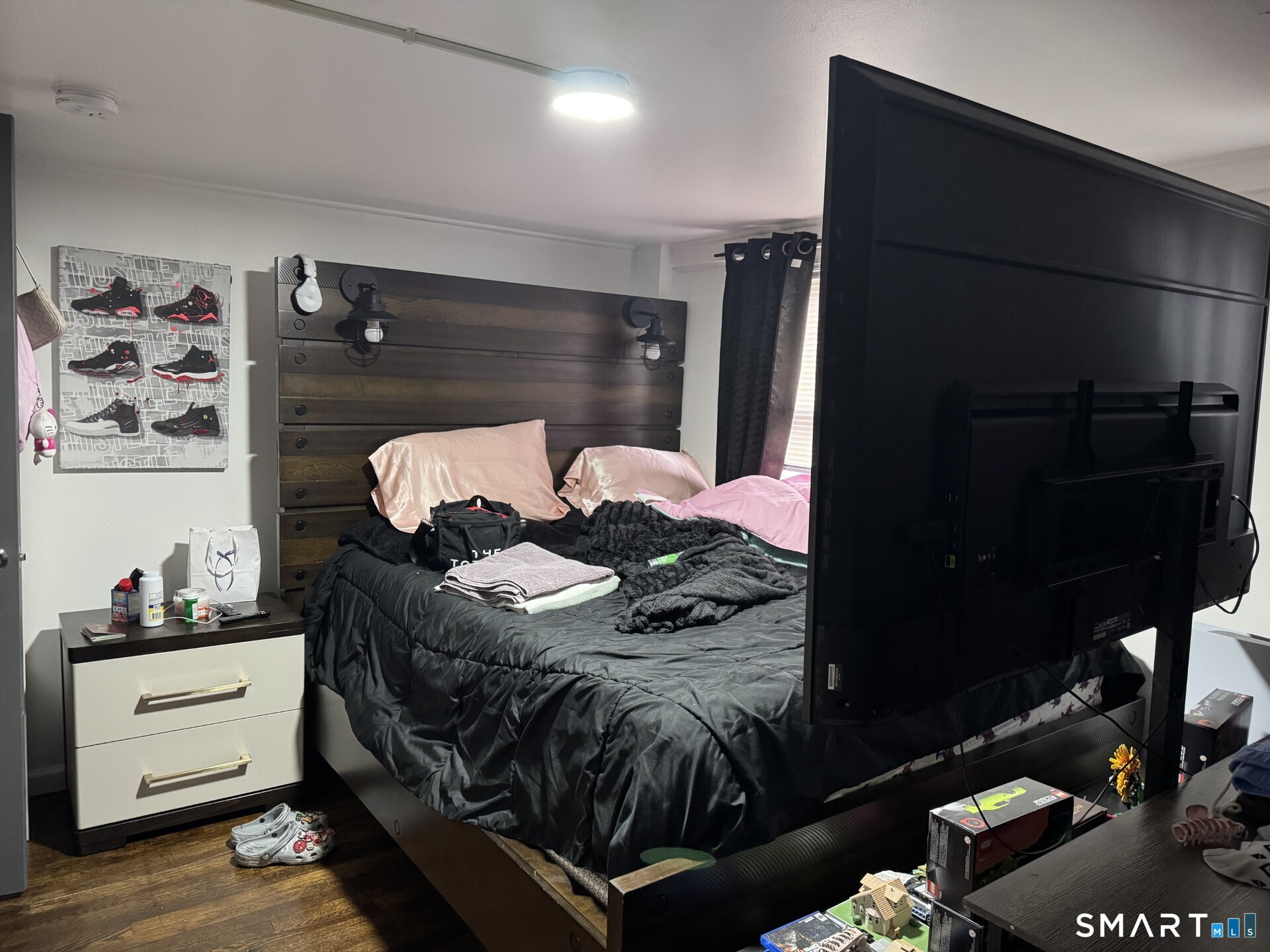 34-36 Cottage Street Manchester, CT 06040 - Photo 15 of 40 a bed room with a bed and a window