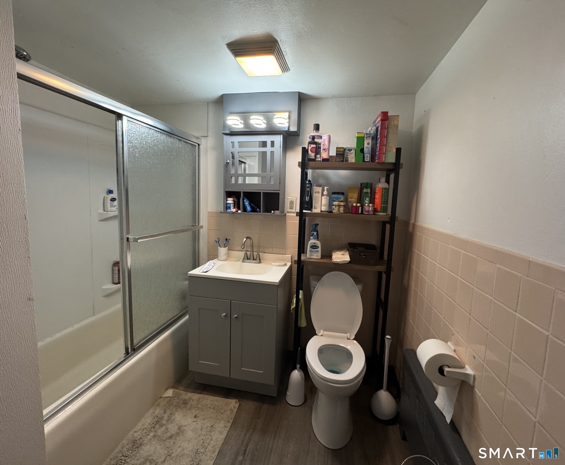 34-36 Cottage Street Manchester, CT 06040 - Photo 20 of 40 a bathroom with a toilet and a sink