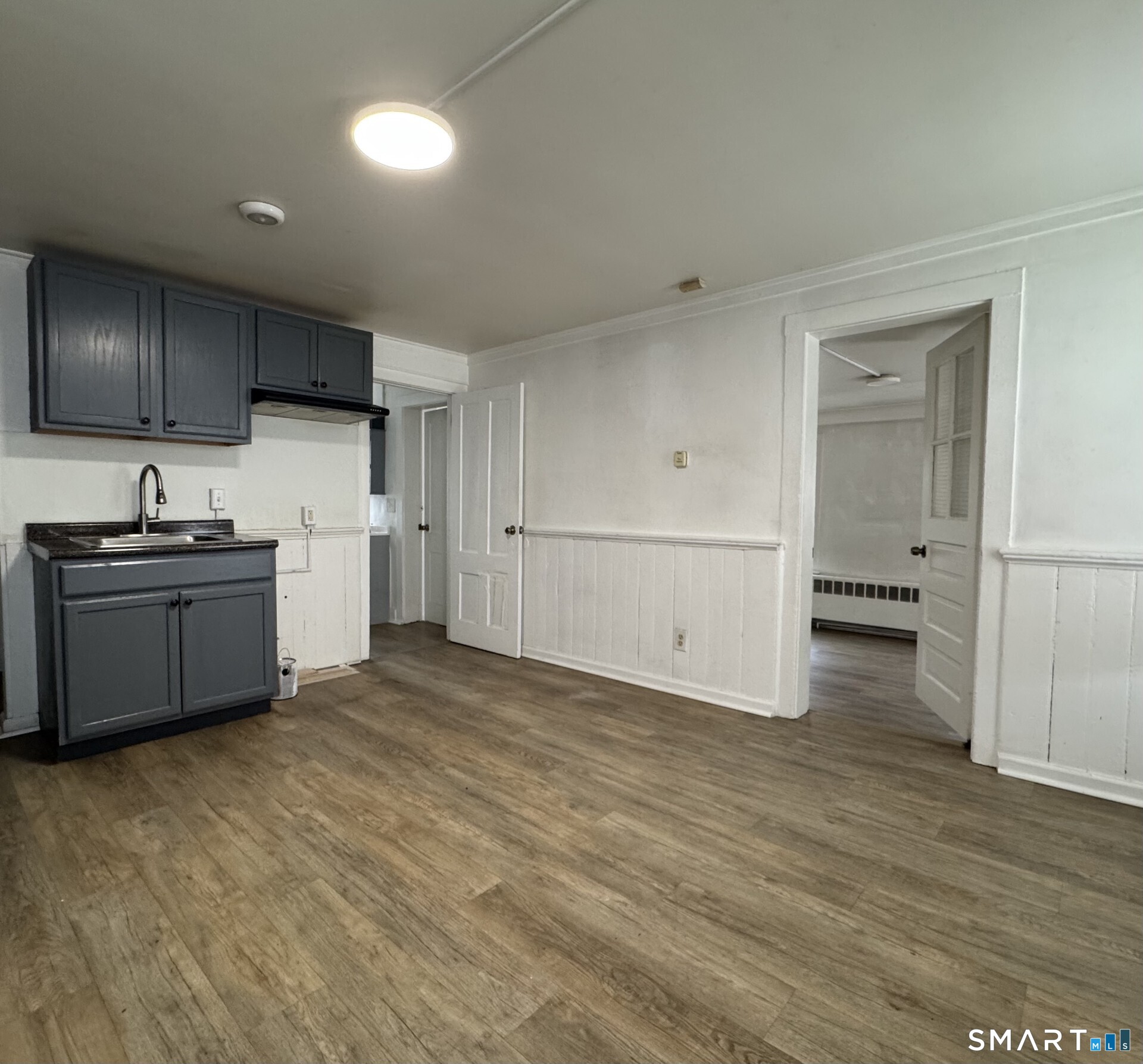 34-36 Cottage Street Manchester, CT 06040 - Photo 24 of 40 a kitchen with a sink and cabinets