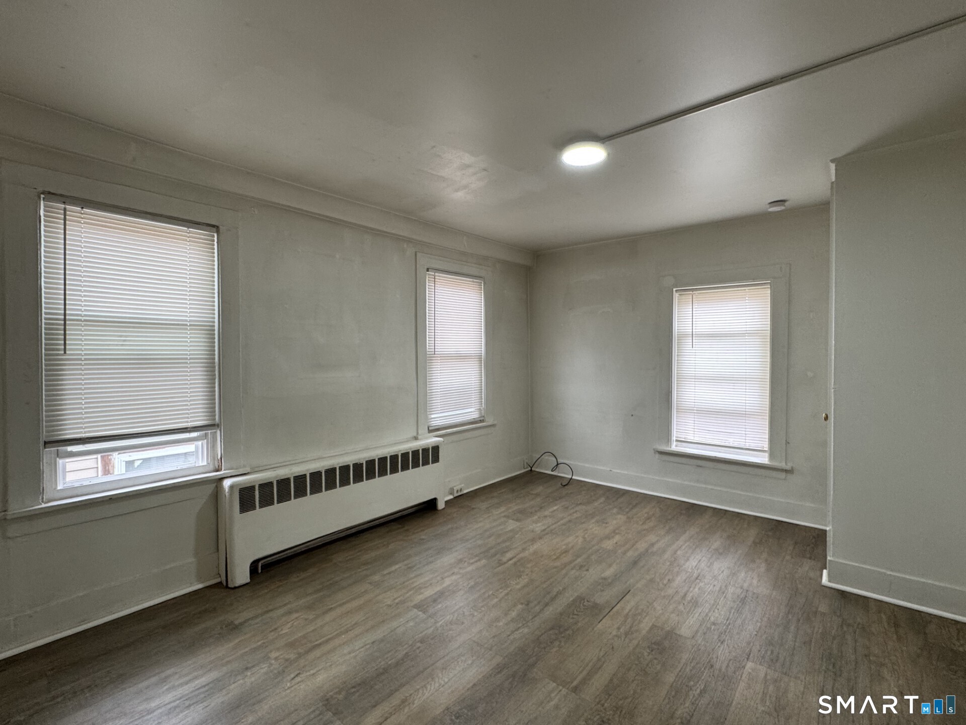 34-36 Cottage Street Manchester, CT 06040 - Photo 25 of 40 a view of an empty room and a window