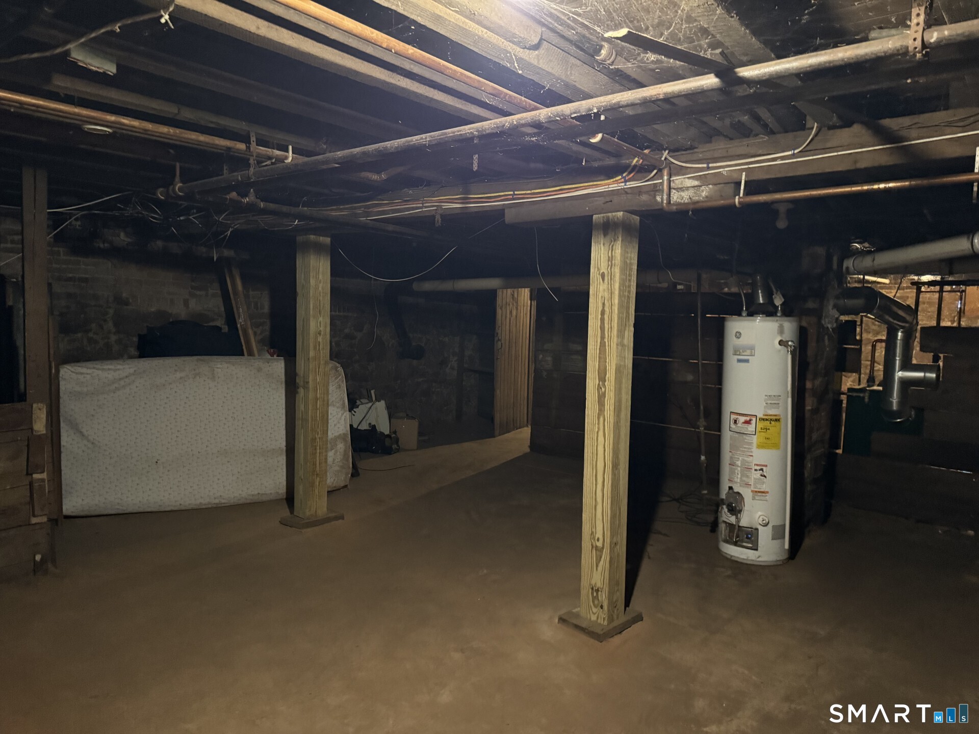 34-36 Cottage Street Manchester, CT 06040 - Photo 40 of 40 a view of an empty room with wooden floor