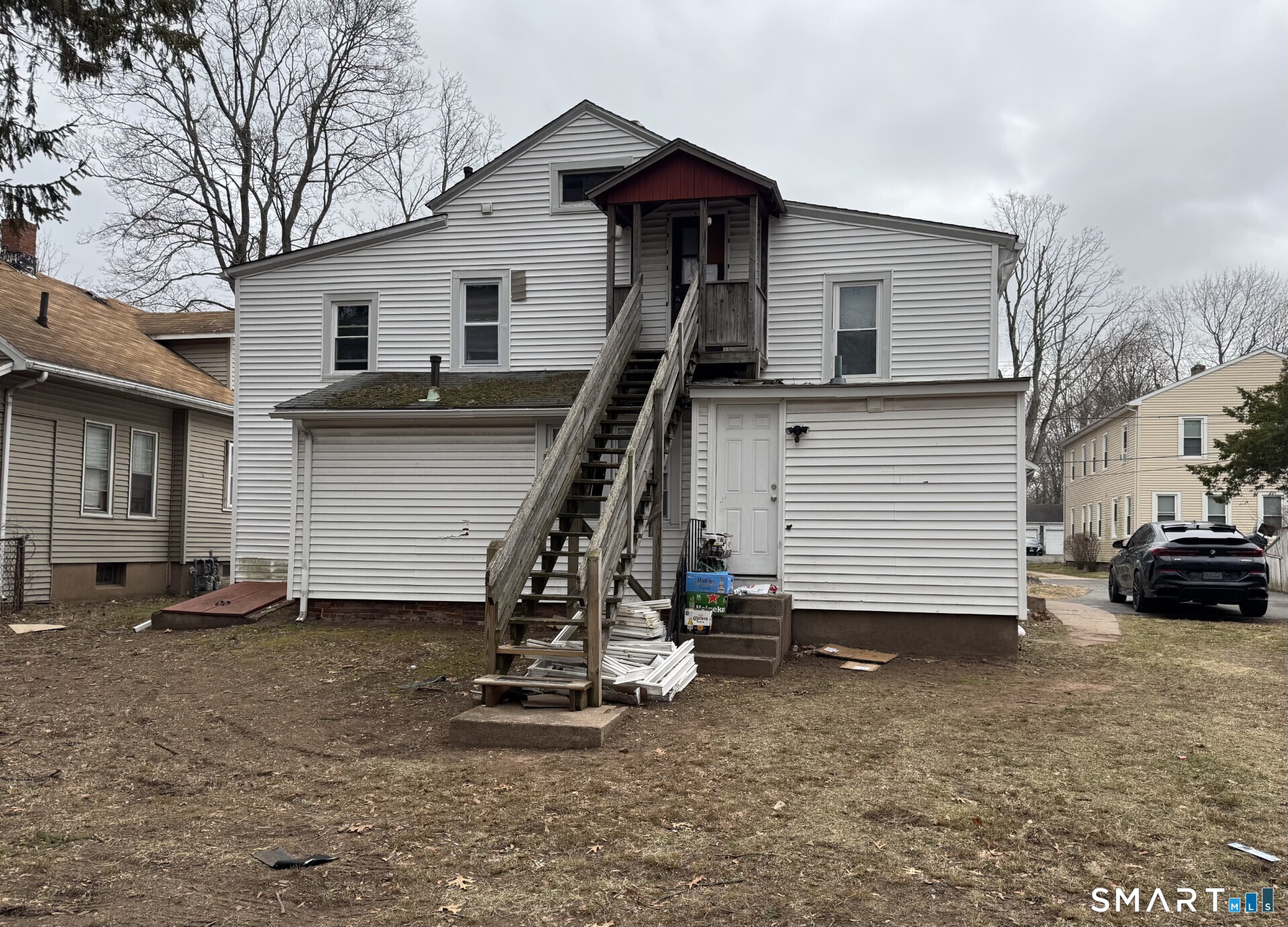 34-36 Cottage Street Manchester, CT 06040 - Photo 4 of 40 a view of a house with a yard