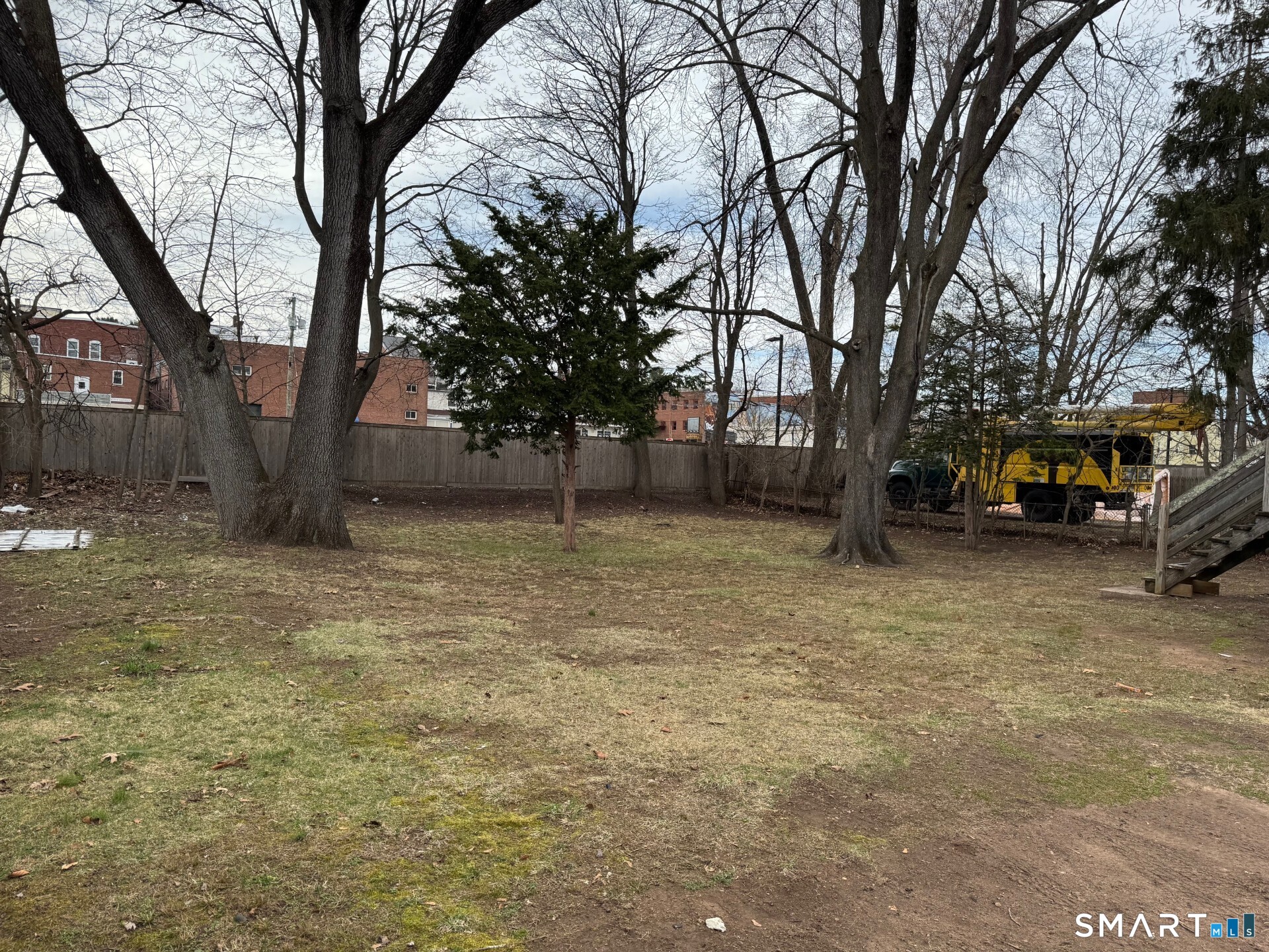 34-36 Cottage Street Manchester, CT 06040 - Photo 7 of 40 a view of a yard with a large tree