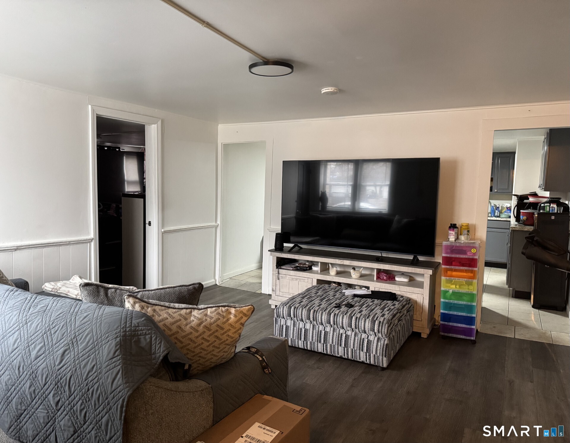 34-36 Cottage Street Manchester, CT 06040 - Photo 8 of 40 a living room with furniture and a flat screen tv