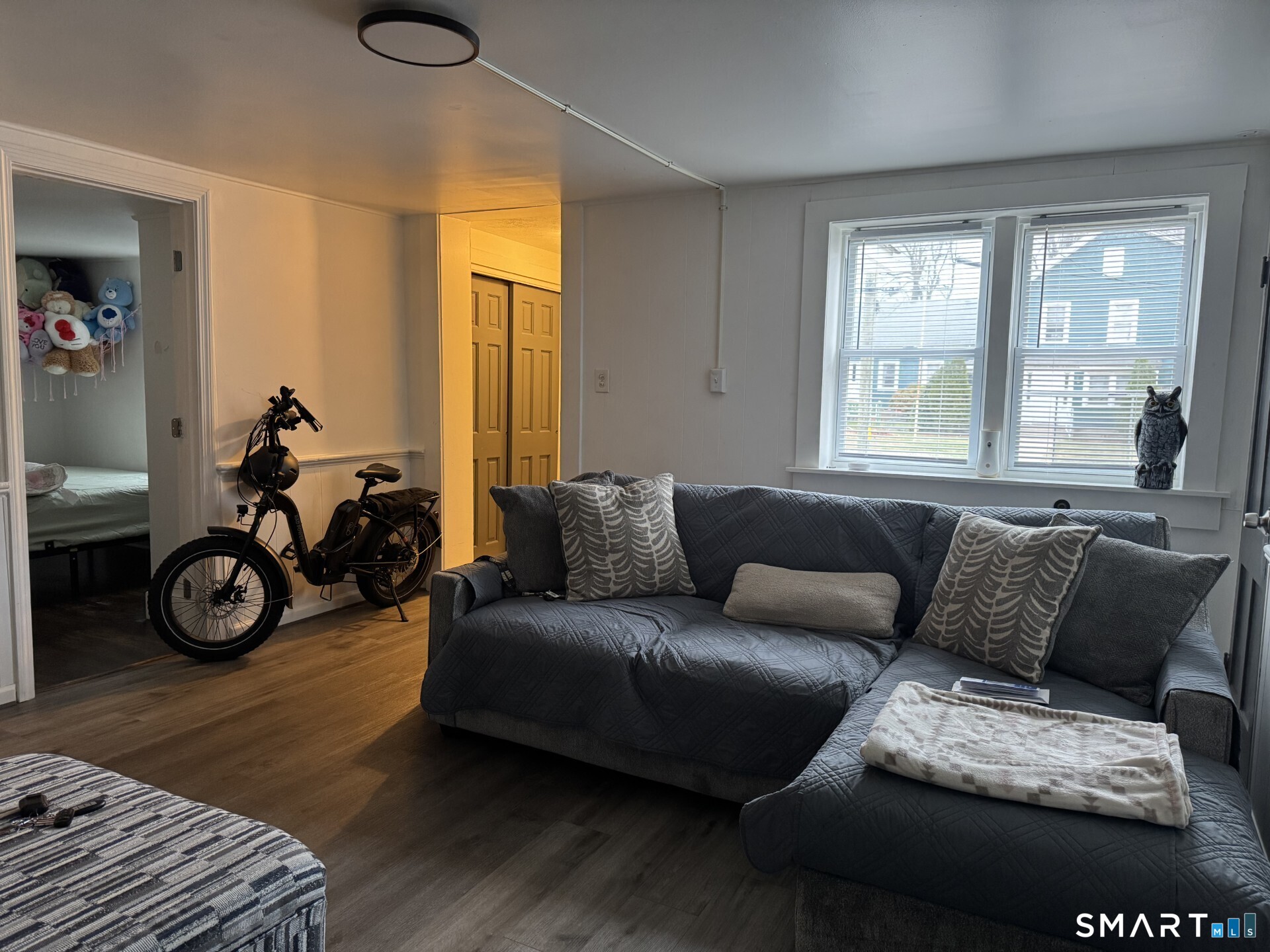 34-36 Cottage Street Manchester, CT 06040 - Photo 9 of 40 a view of a livingroom with furniture and a window