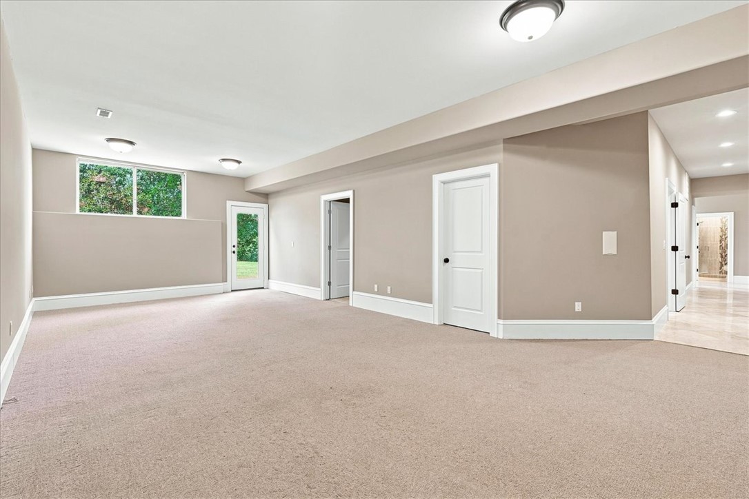 181 Sentell Road Williamston, SC 29697 - Photo 37 of 46 A spacious gym/recreation room provides large sauna, shower, and full bath and direct outdoor access through a glass door.