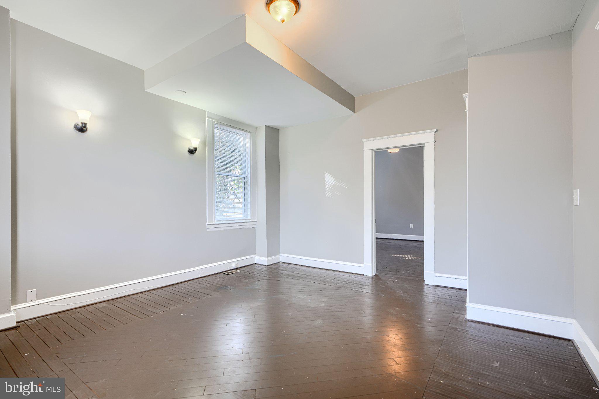 3414 Alto Road, Unit 1 Baltimore, MD 21216 - Photo 5 of 18 Spacious room with natural light.